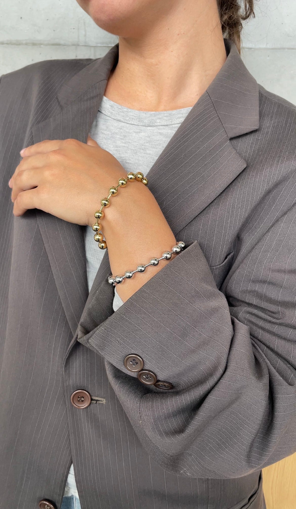 Bracciale in metallo con perla