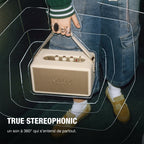 Marshall – Kilburn III - Portable Speaker - Cream, a person carrying a beige portable speaker with gold details