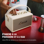 Marshall – Kilburn III - Portable Speaker - Cream, cream-coloured Marshall portable speaker placed on a red table