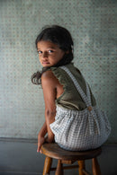 Romper Oona papel cuadriculado - Selección Soor Ploom para encontrar en amaetc.com, tienda conceptual ecológica para niños