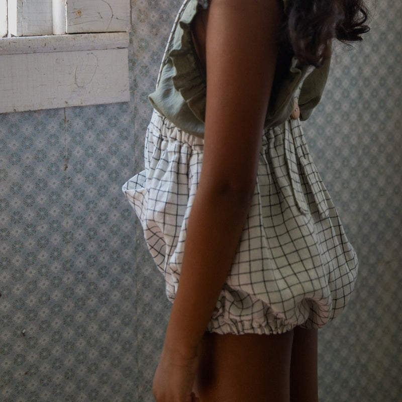 Romper Oona papel cuadriculado - Selección Soor Ploom para encontrar en amaetc.com, tienda conceptual ecológica para niños