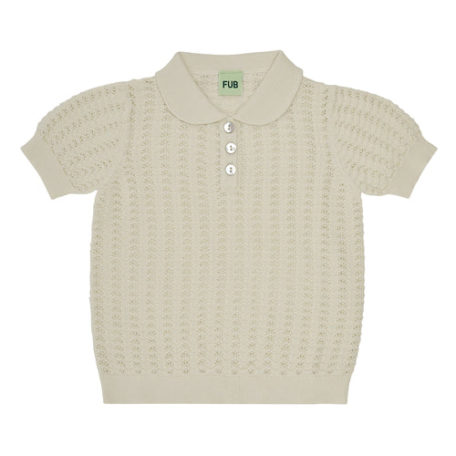 Polo pointelle crudo de algodón orgánico con etiqueta GOTS - Selección FUB en amaetc.com, concept store eco amigable para niños