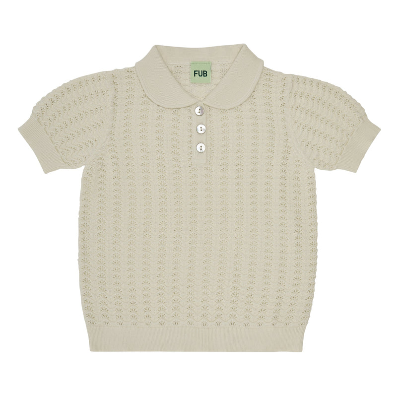 Polo pointelle crudo de algodón orgánico con etiqueta GOTS - Selección FUB en amaetc.com, concept store eco amigable para niños