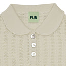 Polo pointelle crudo de algodón orgánico con etiqueta GOTS - Selección FUB en amaetc.com, concept store eco amigable para niños