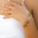 Bracelet fleur acier inoxydable doré 