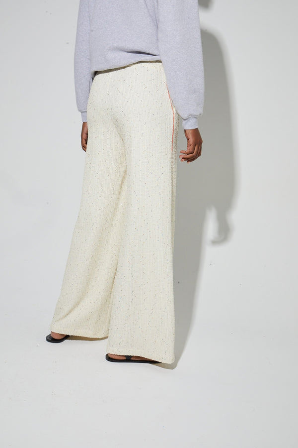 Pantalones Charlie de punto natural, fabricados en Italia