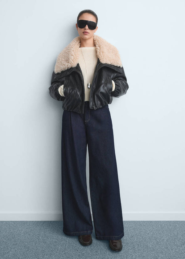 Jeans larghi con pinces