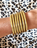 Brazalete budista - oro claro