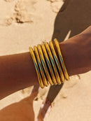 Brazalete budista - oro claro