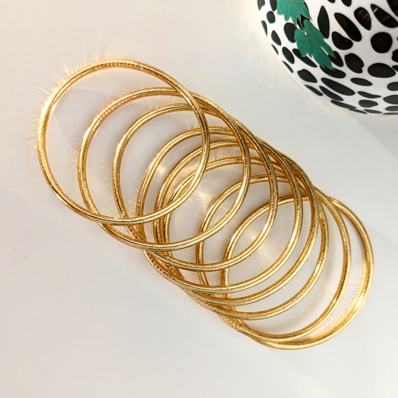 Brazalete budista - oro claro