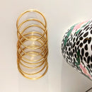 Brazalete budista fino - oro claro