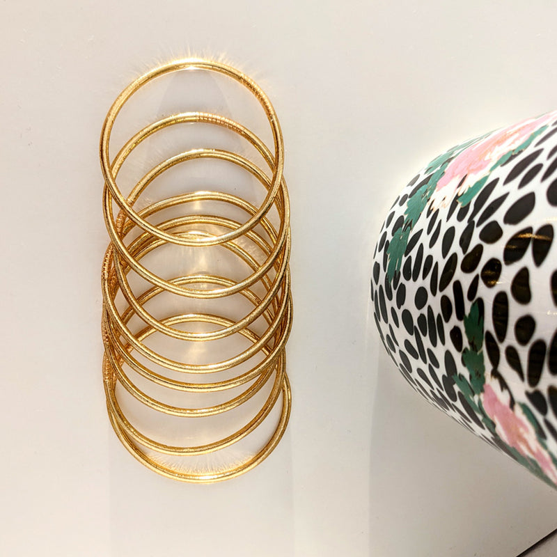 Brazalete budista fino - oro claro