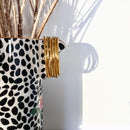 Brazalete budista fino - oro claro