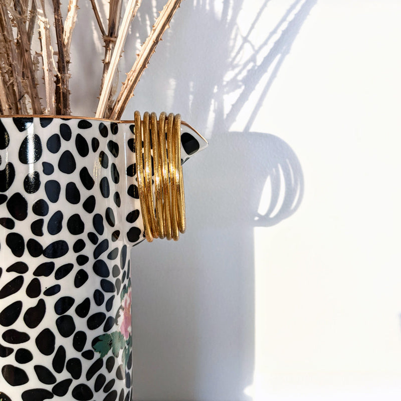 Brazalete budista fino - oro claro