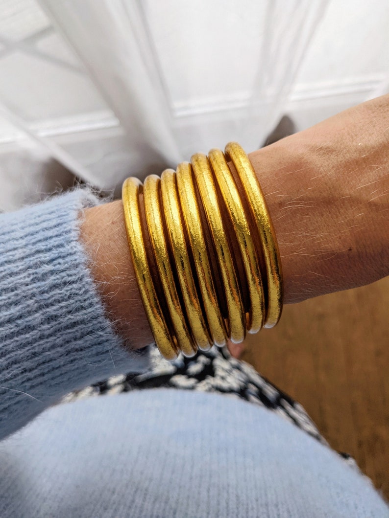 Fine Buddhist bangle - champagne