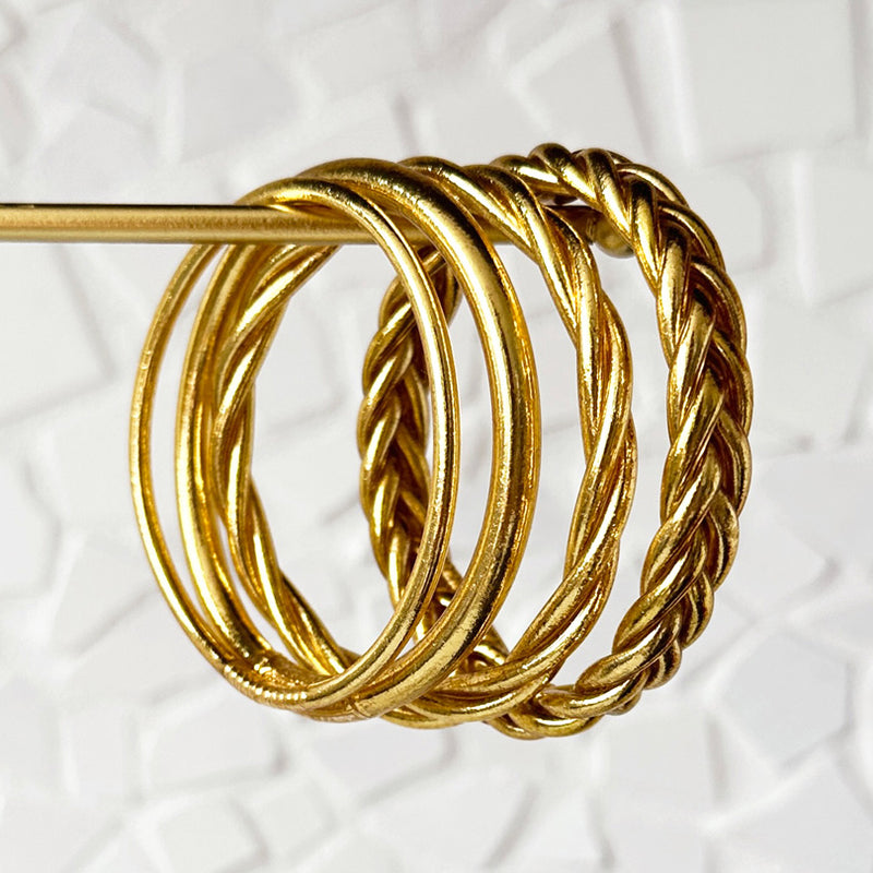Brazalete budista trenzado - oro claro