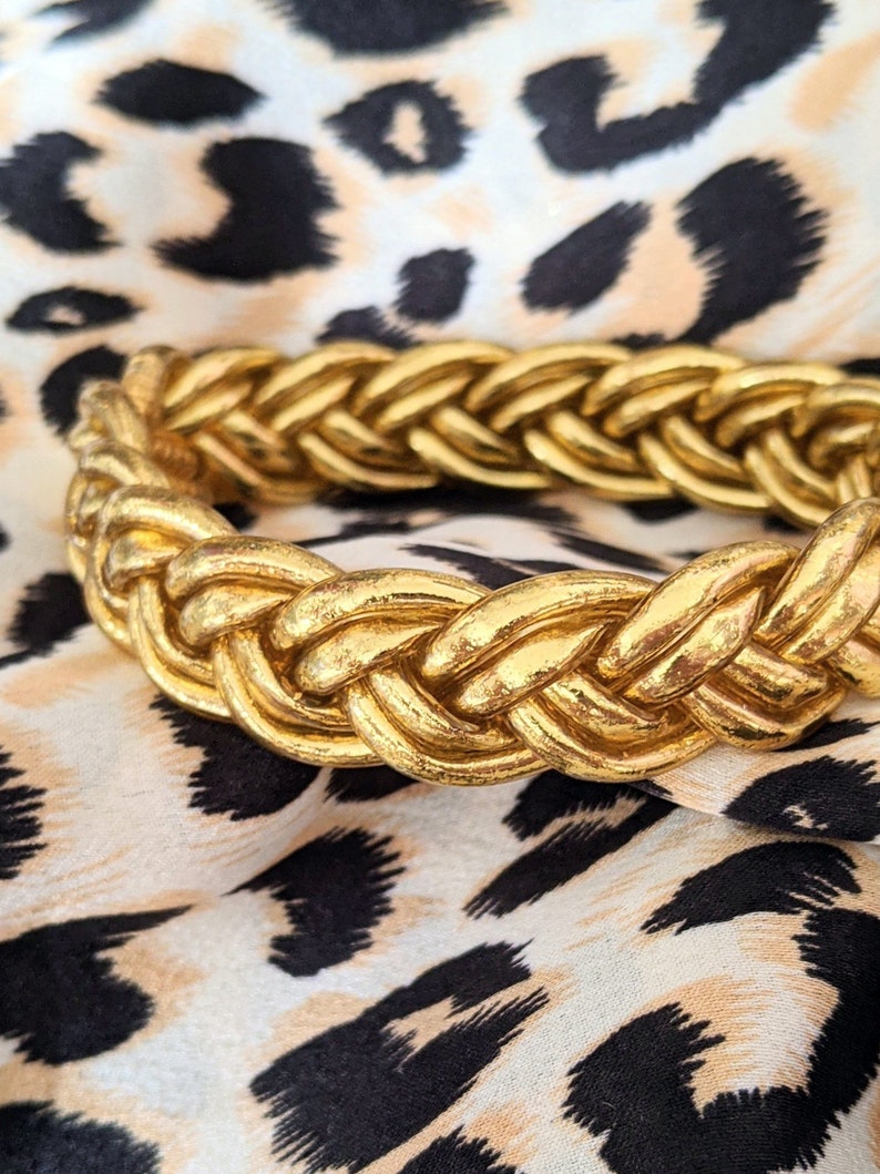 Brazalete budista trenzado - oro claro