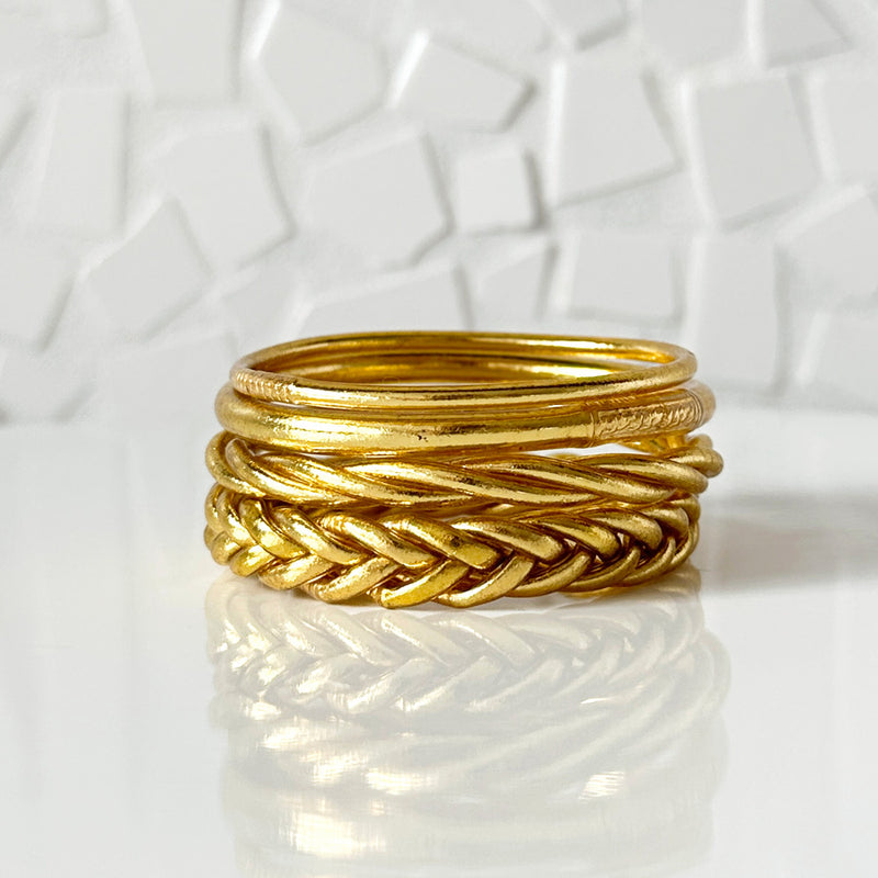 Brazalete budista trenzado - oro claro
