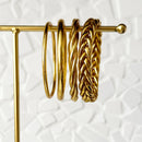 Brazalete budista trenzado - oro claro