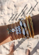 Brazalete budista plano 12mm - oro claro