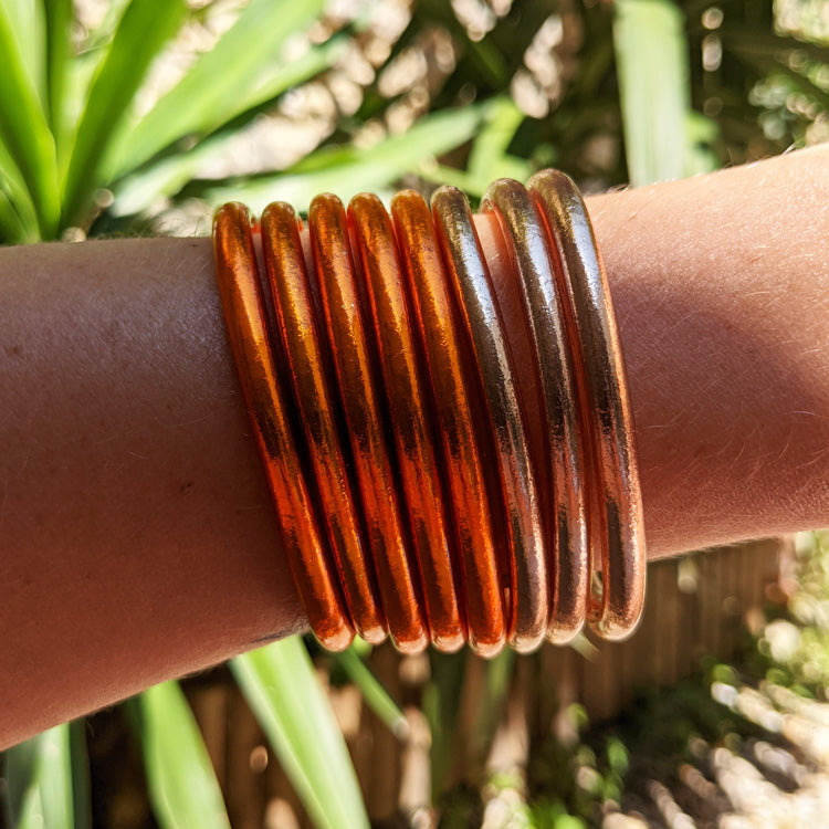 Brazalete budista trenzado - naranja fuego
