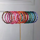 Brazalete budista retorcido - oro claro