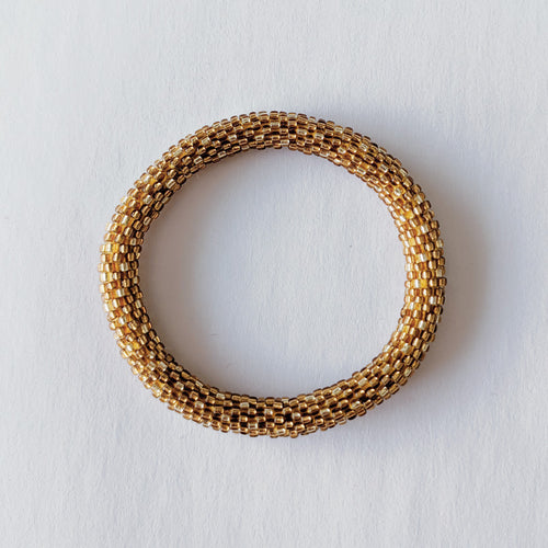 Pulsera nepalí #5 (oro antiguo)