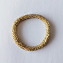 Pulsera nepalí #7 (oro claro)