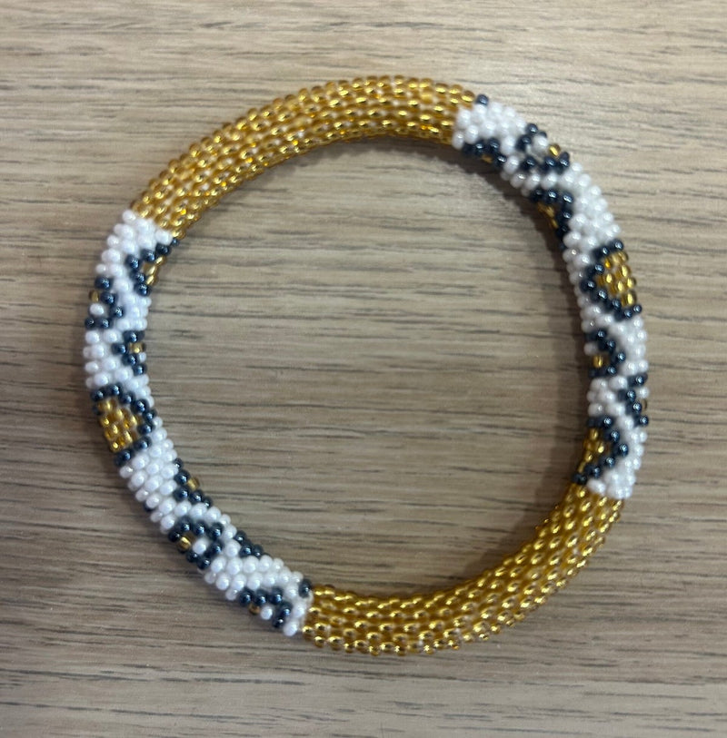 Pulsera nepalí #7 (oro claro)