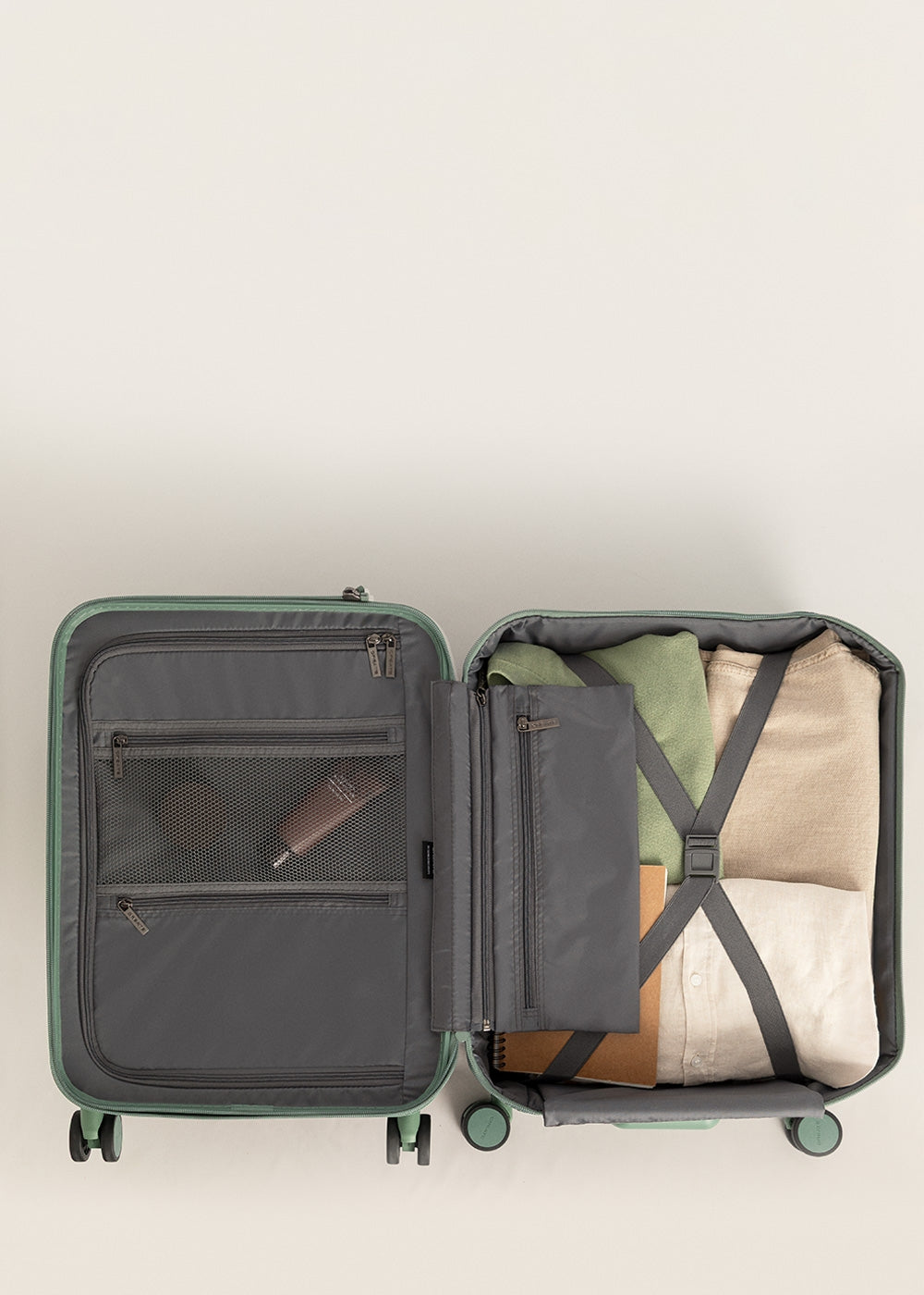 Luggage Studio Foldable - Maleta de cabina rígida plegable de policarbonato con cerradura TSA y ruedas multidireccionales - Verde