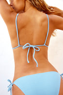 anja haut triangle charmeur denim plan rapproché