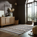 tapis medina en jute gris dans un salon ouvert#couleur_beige