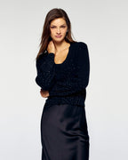 #label: Paige mide 1,81 m y lleva una talla S