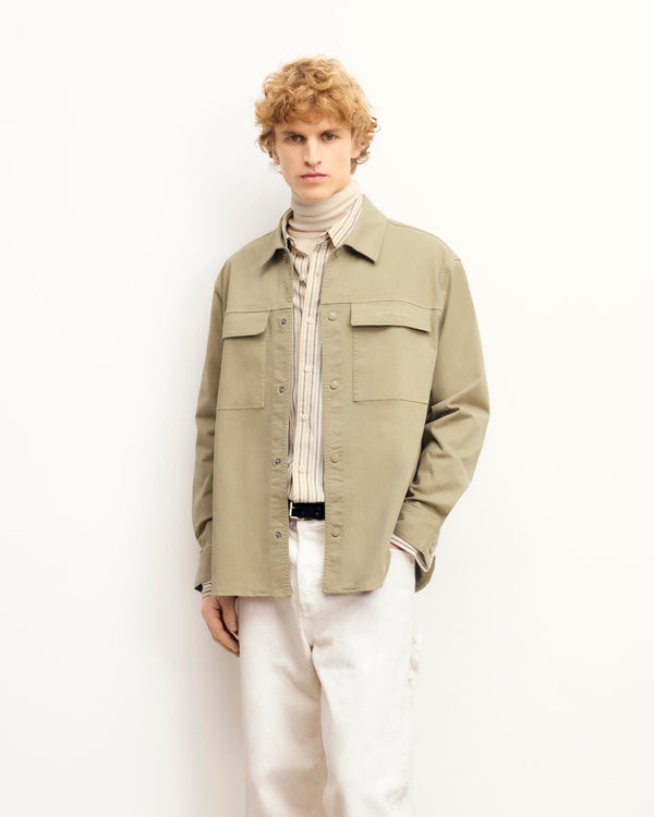 #label: Leon mesure 1,89m et porte une taille M
