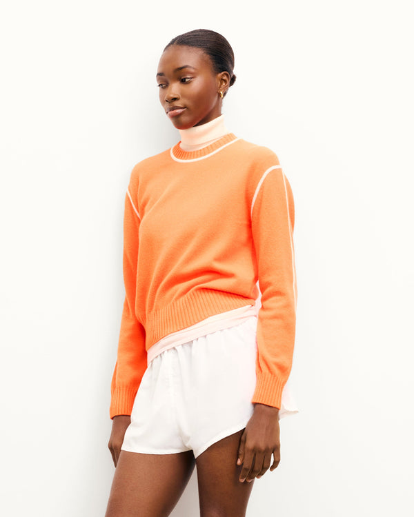 #label: Janelle mesure 1,77m et porte une taille S