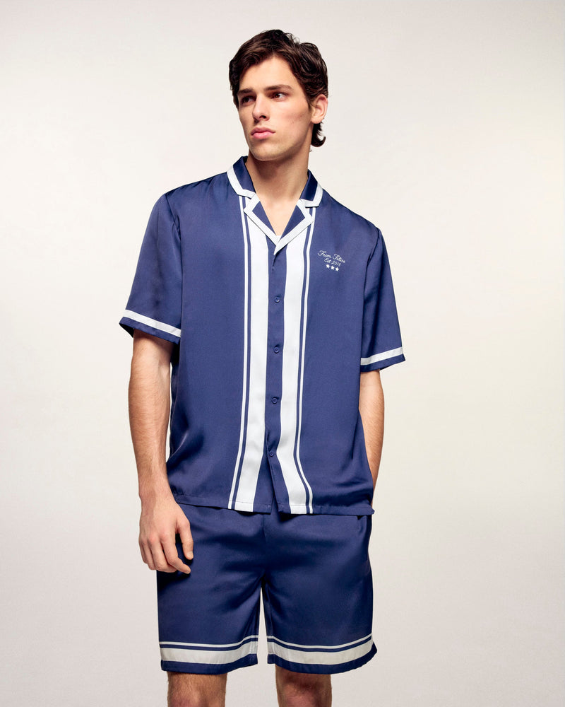 #label: Dren mesure 1,89m et porte une taille M