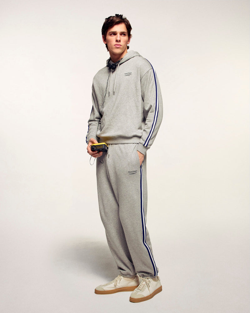 #label: Dren mesure 1,89m et porte une taille M