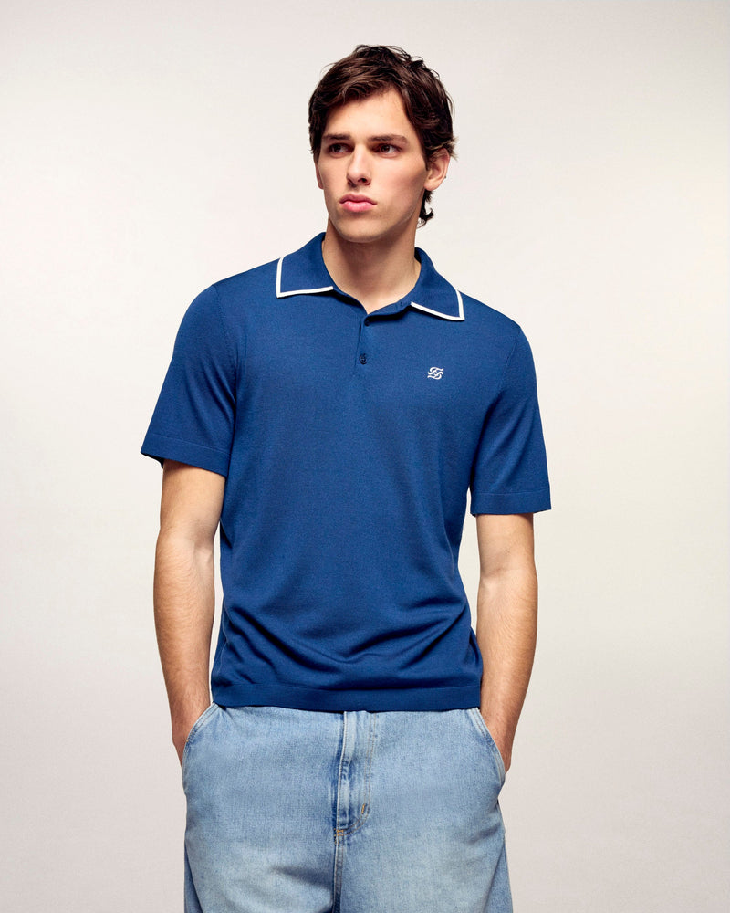 #label: Dren mesure 1,89m et porte une taille M