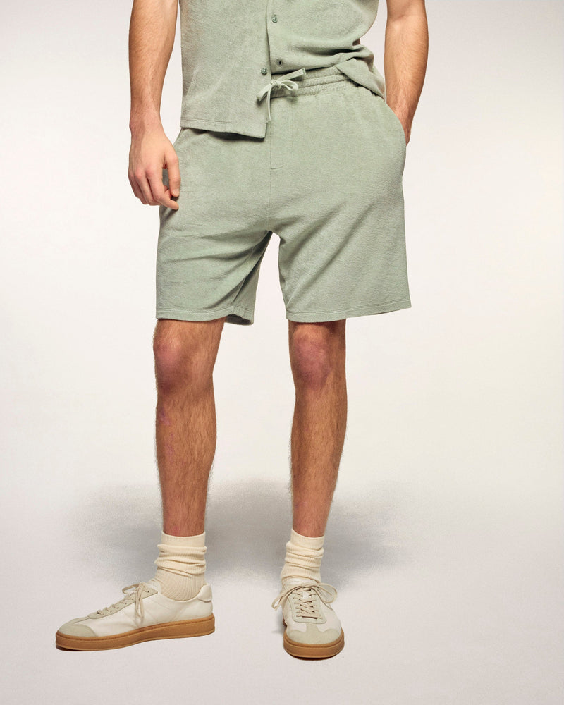 #label: Dren mesure 1,89m et porte une taille M