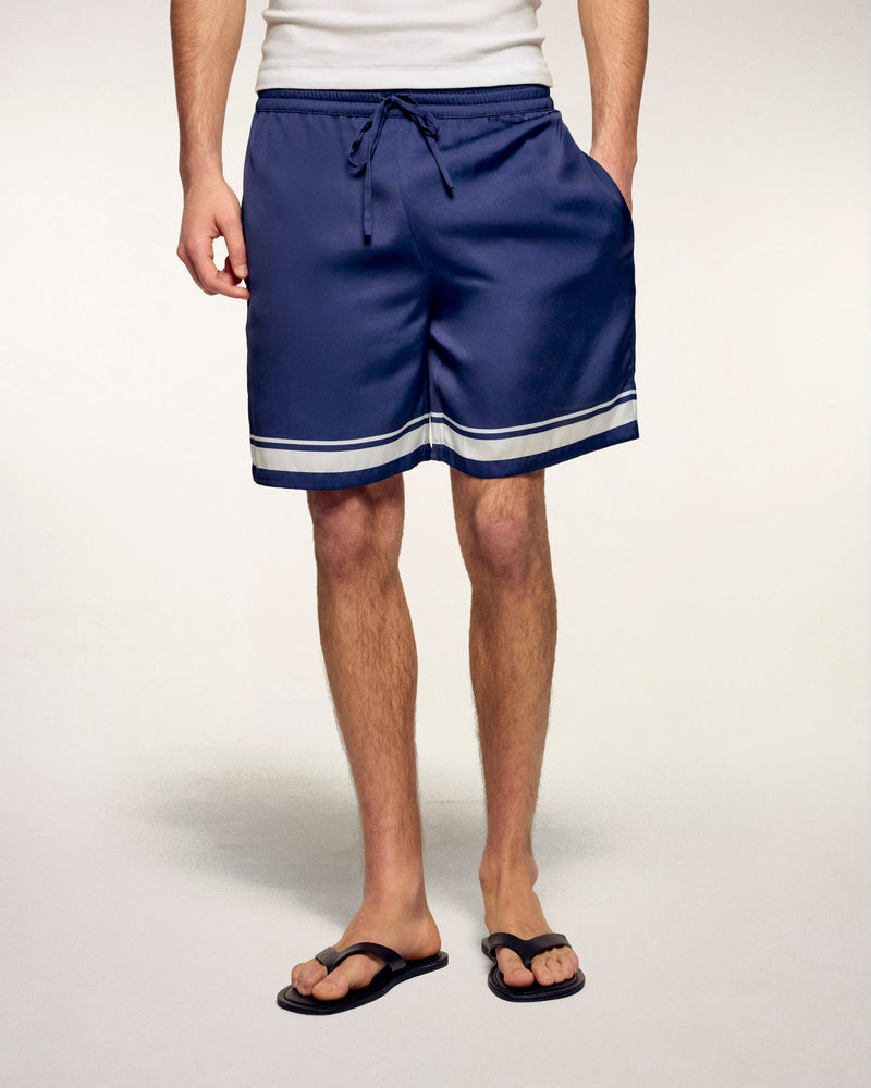 #label: Dren mesure 1,89m et porte une taille M