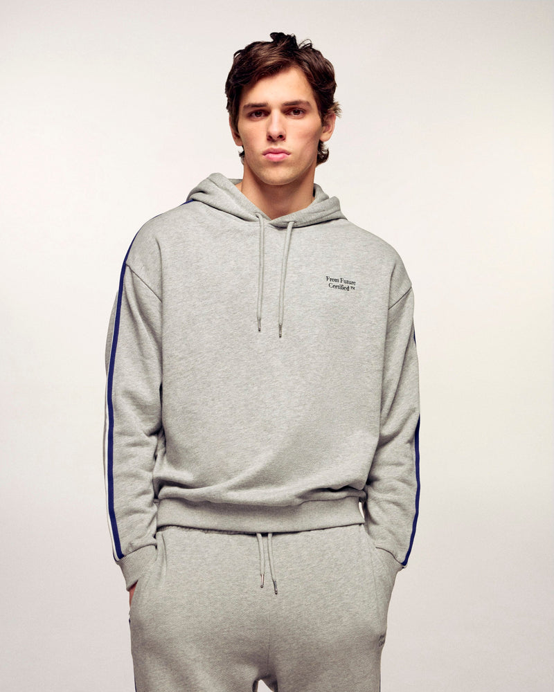 #label: Dren mesure 1,89m et porte une taille M