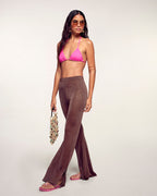#label: Andrea mesure 1,80m et porte une taille S