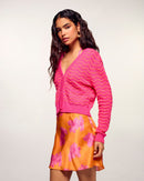 #label: Andrea mesure 1,80m et porte une taille S