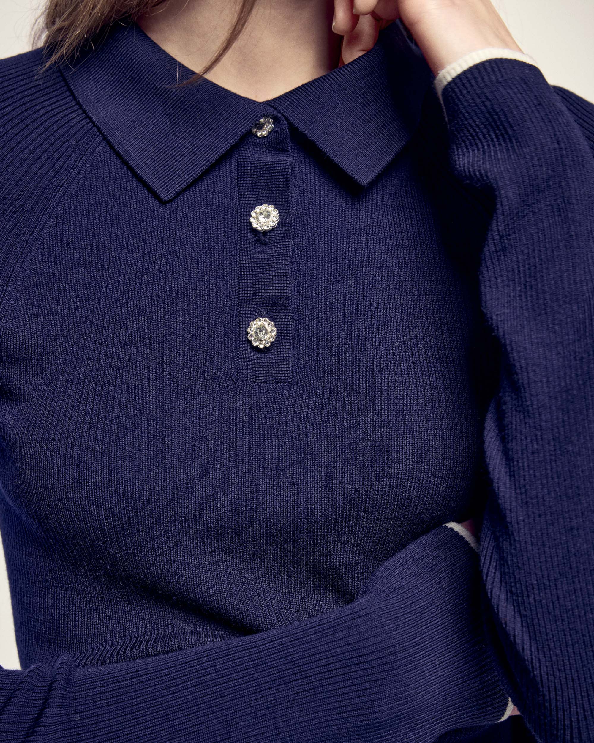 Jersey con cuello tipo polo y botones fantasía