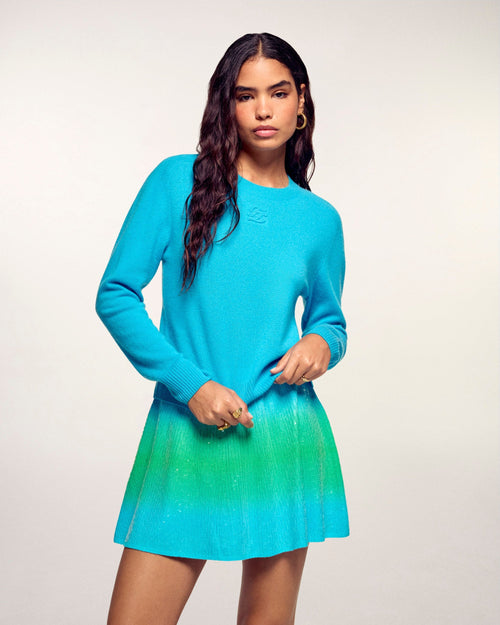 #label: Andrea mesure 1,80m et porte une taille S