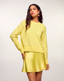 #label: Andrea mesure 1,80m et porte une taille S