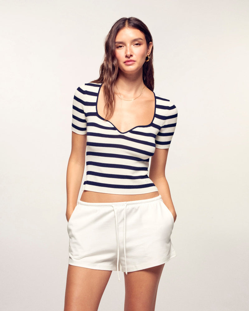 #label: Maria mesure 1,79m et porte une taille S