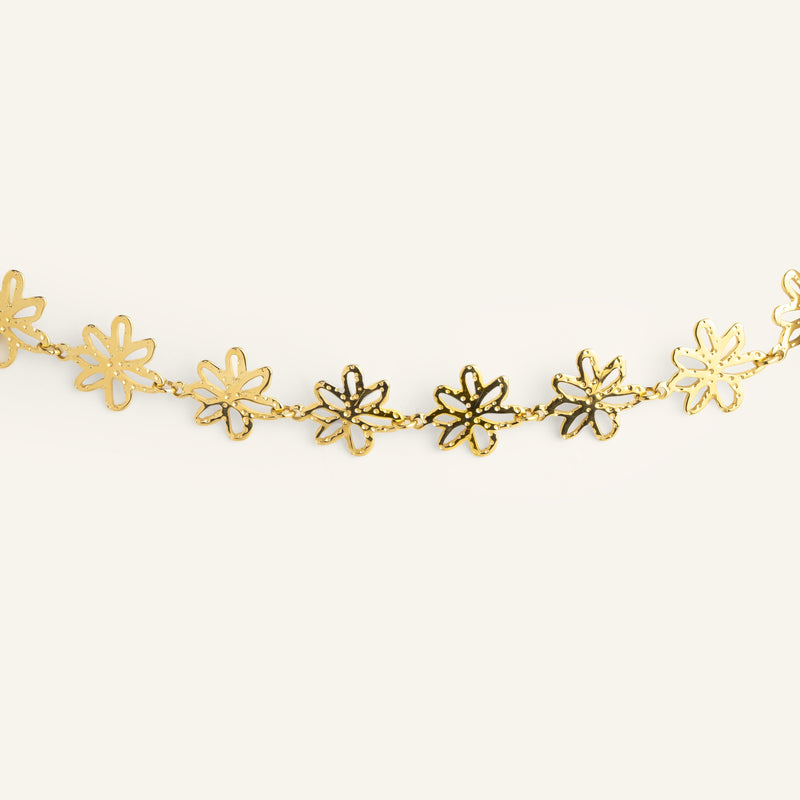 Bracelet fleur acier inoxydable doré 