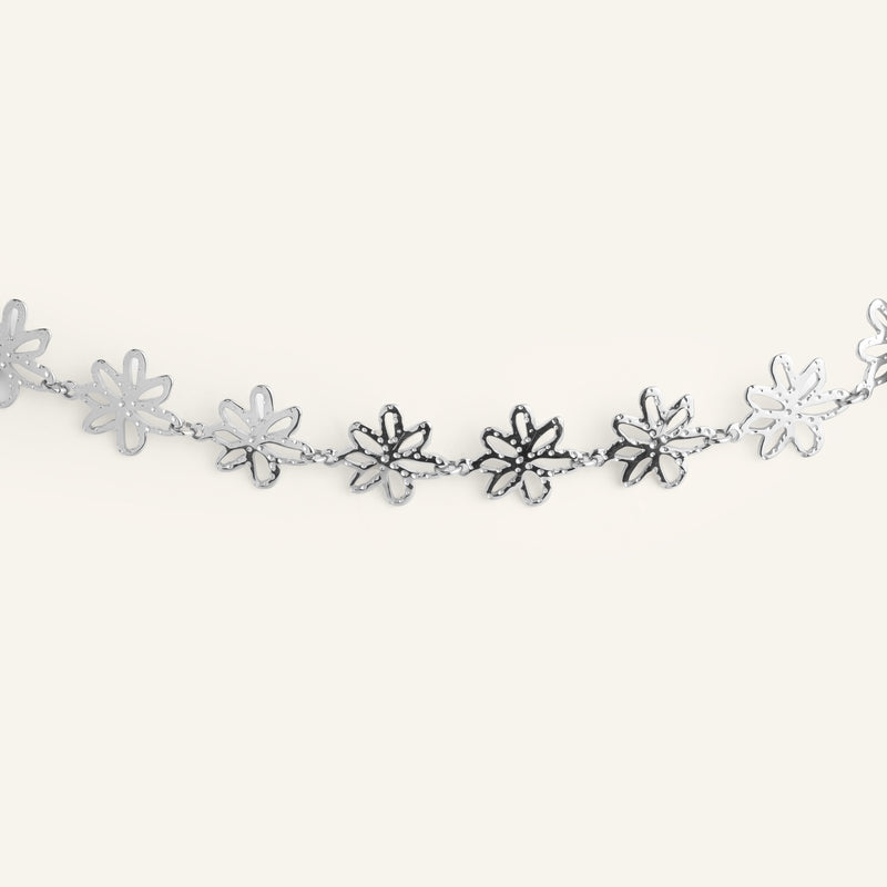 Bracelet fleur acier inoxydable doré 