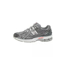 Baskets New Balance U1906 - Gris, Blanc, Rouge.
